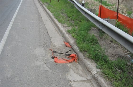 Inlet protection covered in sediment