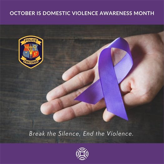 purple ribbon in hand