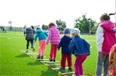 stock image of kids playing outdoors